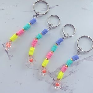 Super cute flower clay bead key chain.